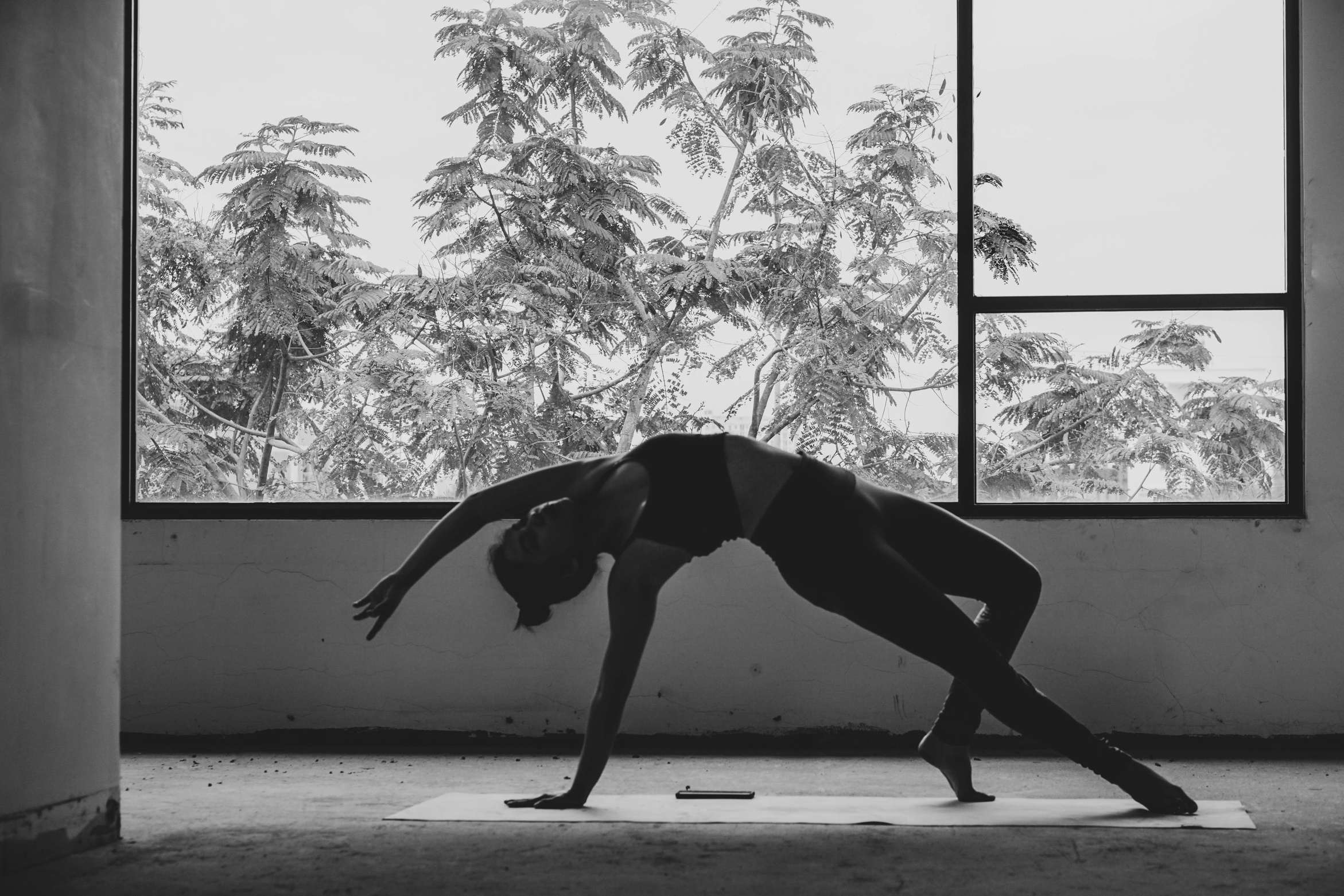 Grayscale Photo of Person Doing Yoga